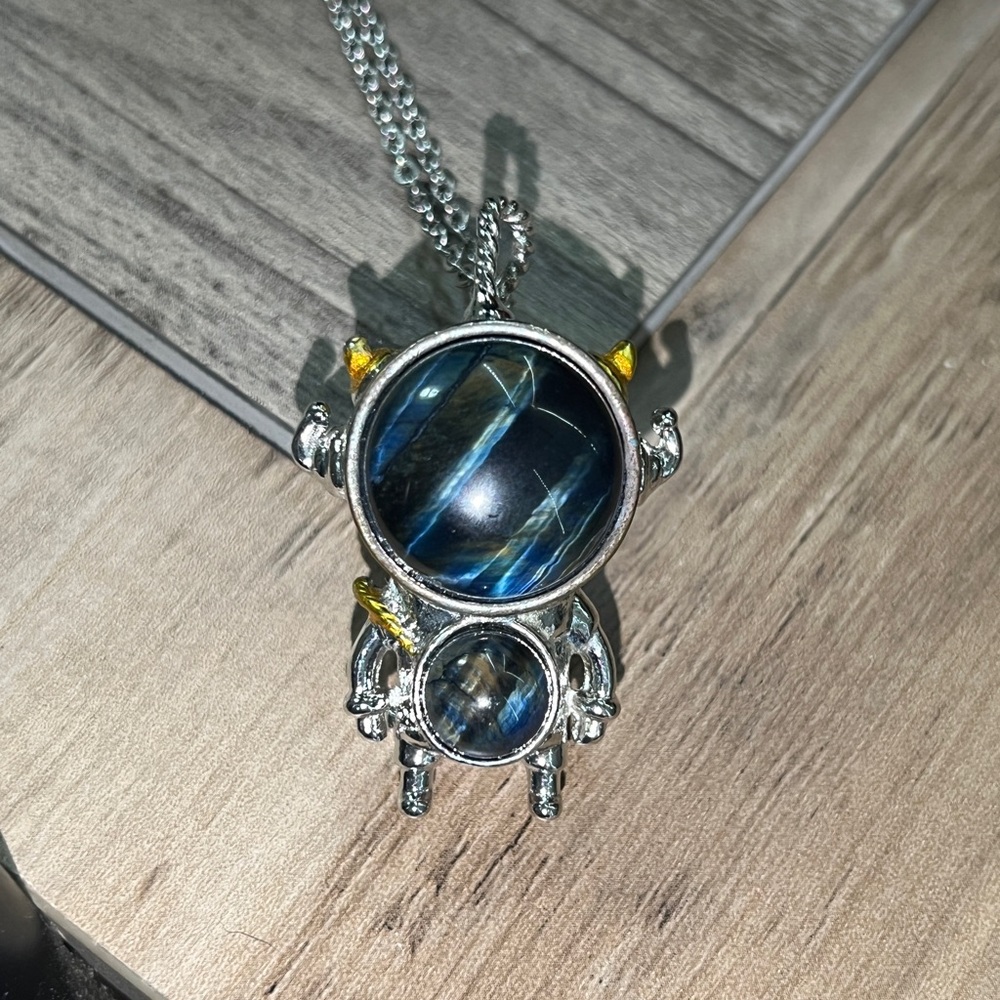 Blue Cats Eye and Silver Astronaut Pendant Necklace